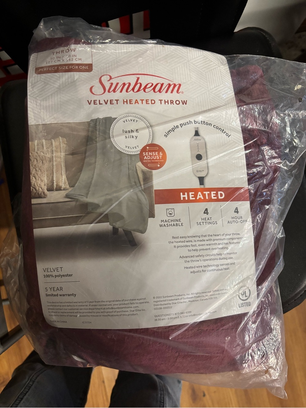 Stay cozy with this Sunbeam velvet heated throw in Cabernet burgundy. Measures 5